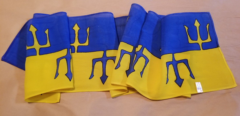 A photo of a silk scarf. The scarf is scrunched up somewhat to include the entire length without 
		making the photo extra wide. The scarf is painted party per fes azure and Or (blue and yellow) with the division line consisting of 
		counterchanged tridents. Painted using the serti method and Dye-na-flow paint.