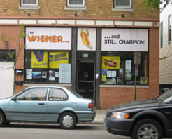 exterior image of Wiener and Still Champion, and a Toyota Tercel